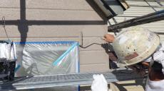 12.山田邸 (壁面上塗り施工中)17.JPG